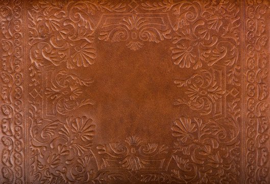 Leather floral pattern background close up