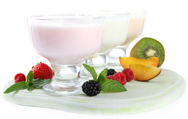 Delicious yogurt with fruit and  berries isolated on white