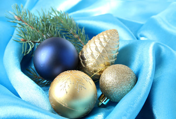 Beautiful Christmas decor on blue satin cloth