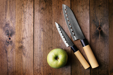 Kitchen knife  on wooden background