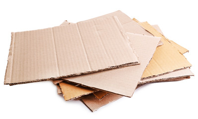 Stack of cardboard for recycling isolated on white