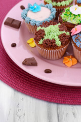 Tasty cupcakes with butter cream,