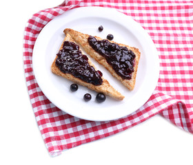 Delicious toast with jam on plate close-up