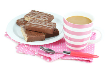 Cup of tea and sweets isolated on white