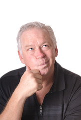 caucasian man contemplating a perplexing problem