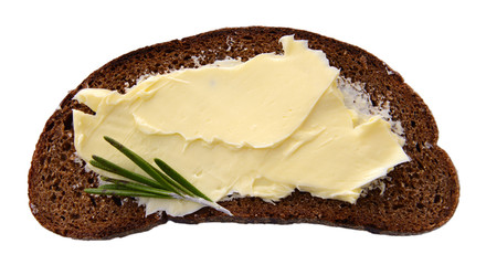Slice of rye bread with butter, isolated on white