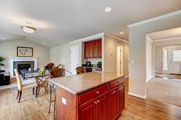 Elegant kitchen room with dining area extended to living room