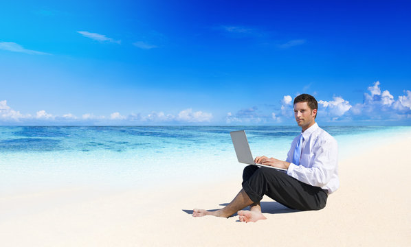 Businessman Working At The Beach