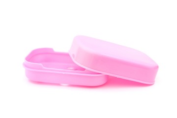 pink plastic soap box on white background