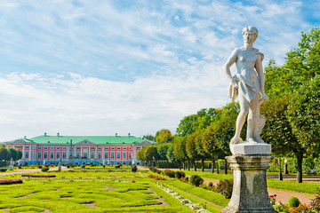 Park with statues and Palace of earl Sheremetyev in mansion Kusk