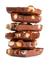 stack of pieces of chocolate with nuts