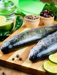Raw trout on the cutting board