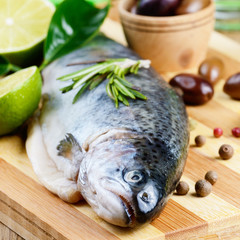 Raw trout on the cutting board