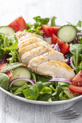 chicken salad with tomatoes and cucumber