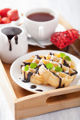 Belgian waffle with chocolate raspberry and hearts for Valentine