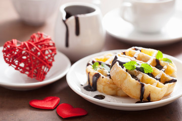 Belgian waffle with chocolate raspberry and hearts for Valentine