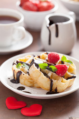 Belgian waffle with chocolate raspberry and hearts for Valentine