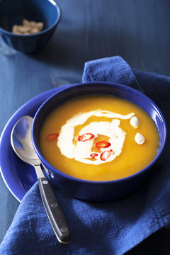 pumpkin soup in blue bowl