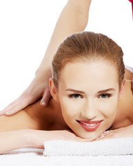 Naklejka premium Beautiful caucasian woman lying and relaxing at spa saloon, havi