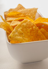 tortilla chips in white bowl