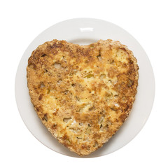 cake, heart shaped with apples in plate, isolated