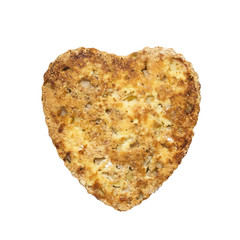 Sponge cake in heart shaped with apples and sesame , isolated