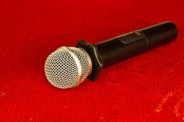 the microphone on red background