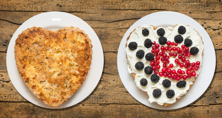 decoration biscuit cake with whipped cream and berries