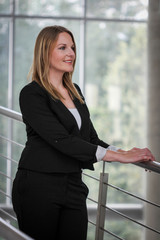 Businesswoman standing in a modern Building