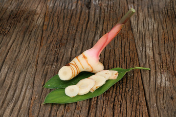 Galangal ginger piece and green leaves