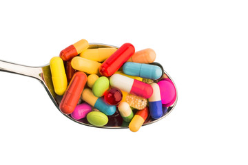 many tablets on spoon