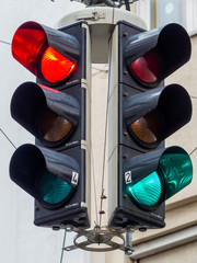 traffic lights with red and green light