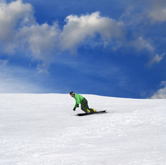 Snowboarder on ski slope