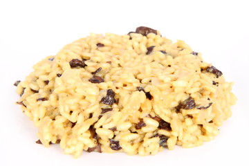 Risotto with mushrooms on a white background