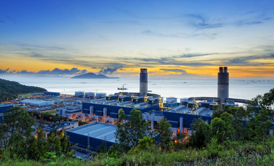 power station at sunset