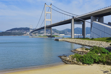 hong kong bridge, Tsing Ma Bridge and beach scenes in summer.