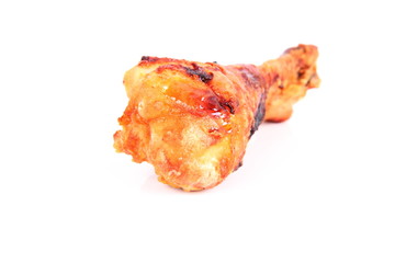 Fried chicken leg on a white background