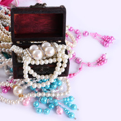 Old wooden box with perl