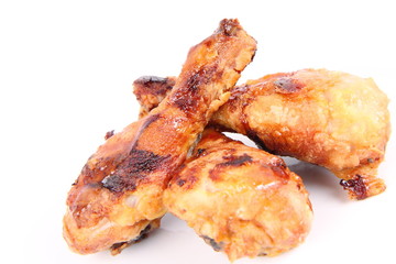 Fried chicken legs on a white background