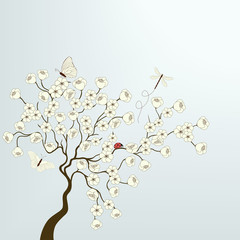 Tree with white flowers and butterflies