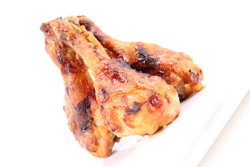 Fried chicken legs on a white background