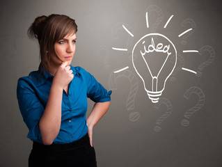 Young girl comming up with a light bubl idea sign