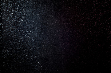 Fototapeta na wymiar Abstract splashes of water on a black background