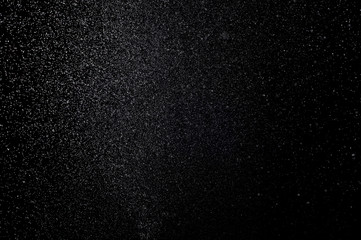 Abstract splashes of water on a black background