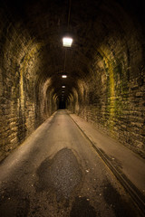 Old vintage tunnel in Biarritz at night