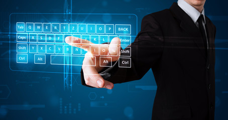 Businessman pressing virtual type of keyboard