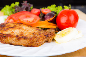 Grilled beef steak with salad