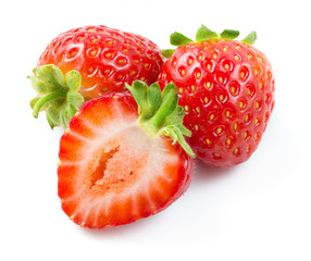 Strawberry. Three berries with a half isolated on white