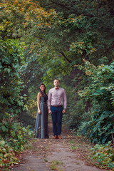 Fototapeta premium young couple in love walks in nature