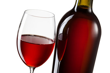 Glass of red wine and bottle isolated on white
